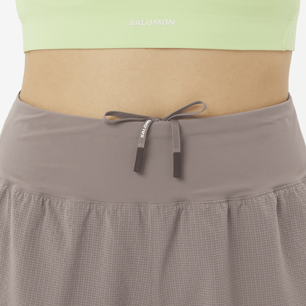 Salomon Sense aero stow 4" short dames